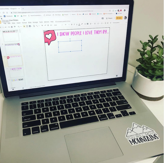 discussion slide with text that reads "I show people I love them by..." on Google Slides on a laptop